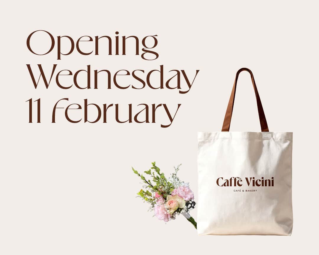 Caffè Vicini opening Wednesday 11 February announcement featuring branded tote bag and floral bouquet on a neutral background.