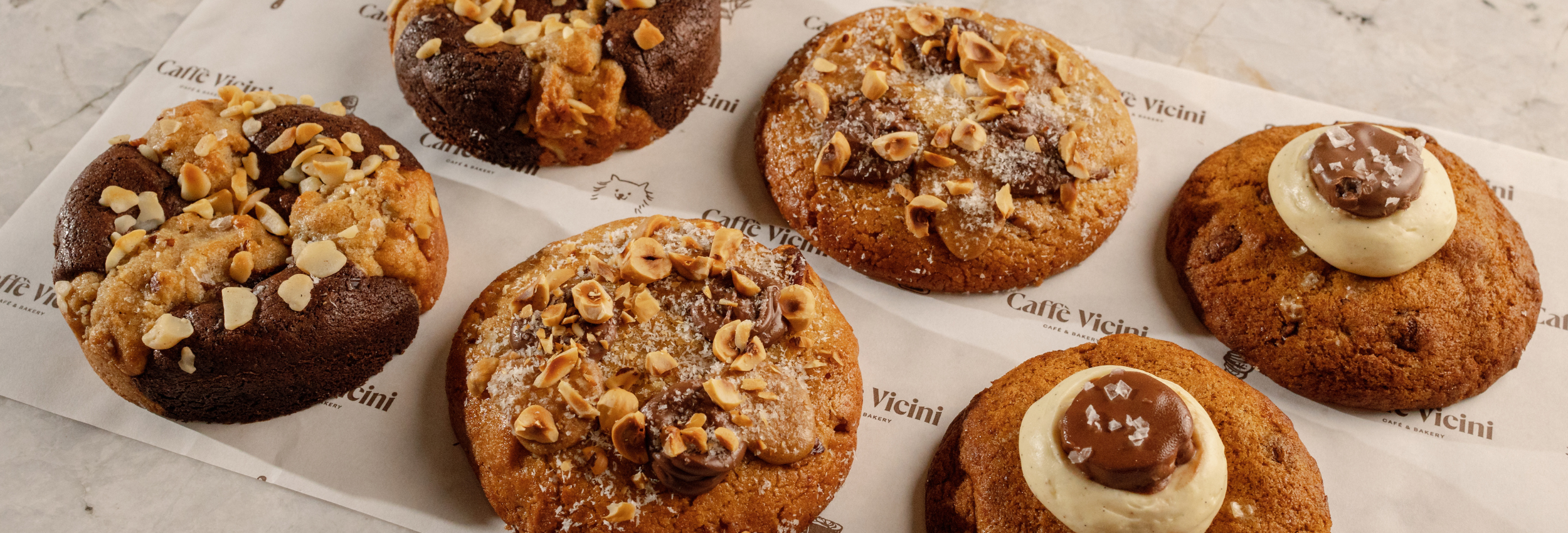 Close-up of rich chocolate brownie with golden crumbs and nuts. cookie variations with different toppings