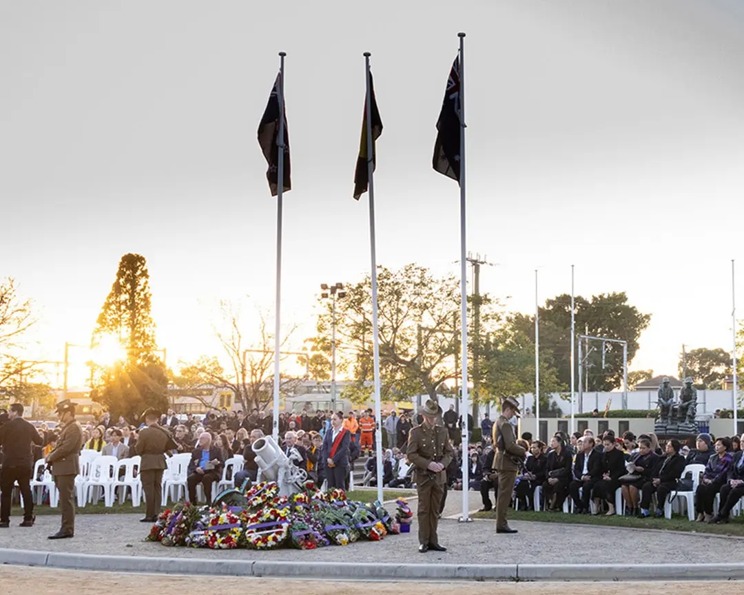 ANZAC Day 2024 dawn service at Cabravale Memorial Park with veterans, wreaths, flags and gathered community members