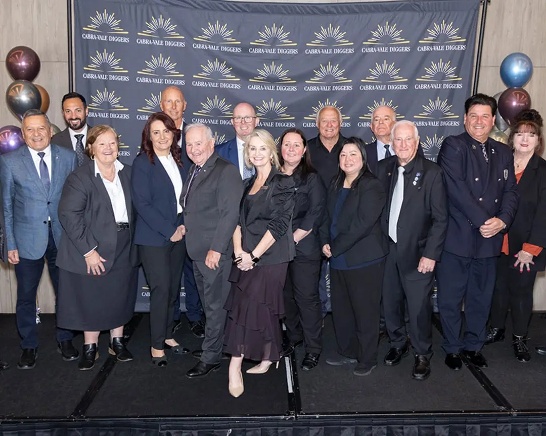 Cabravale employees pose at the ClubGRANTS 2024 presentation hosted by Cabravale Club Resort