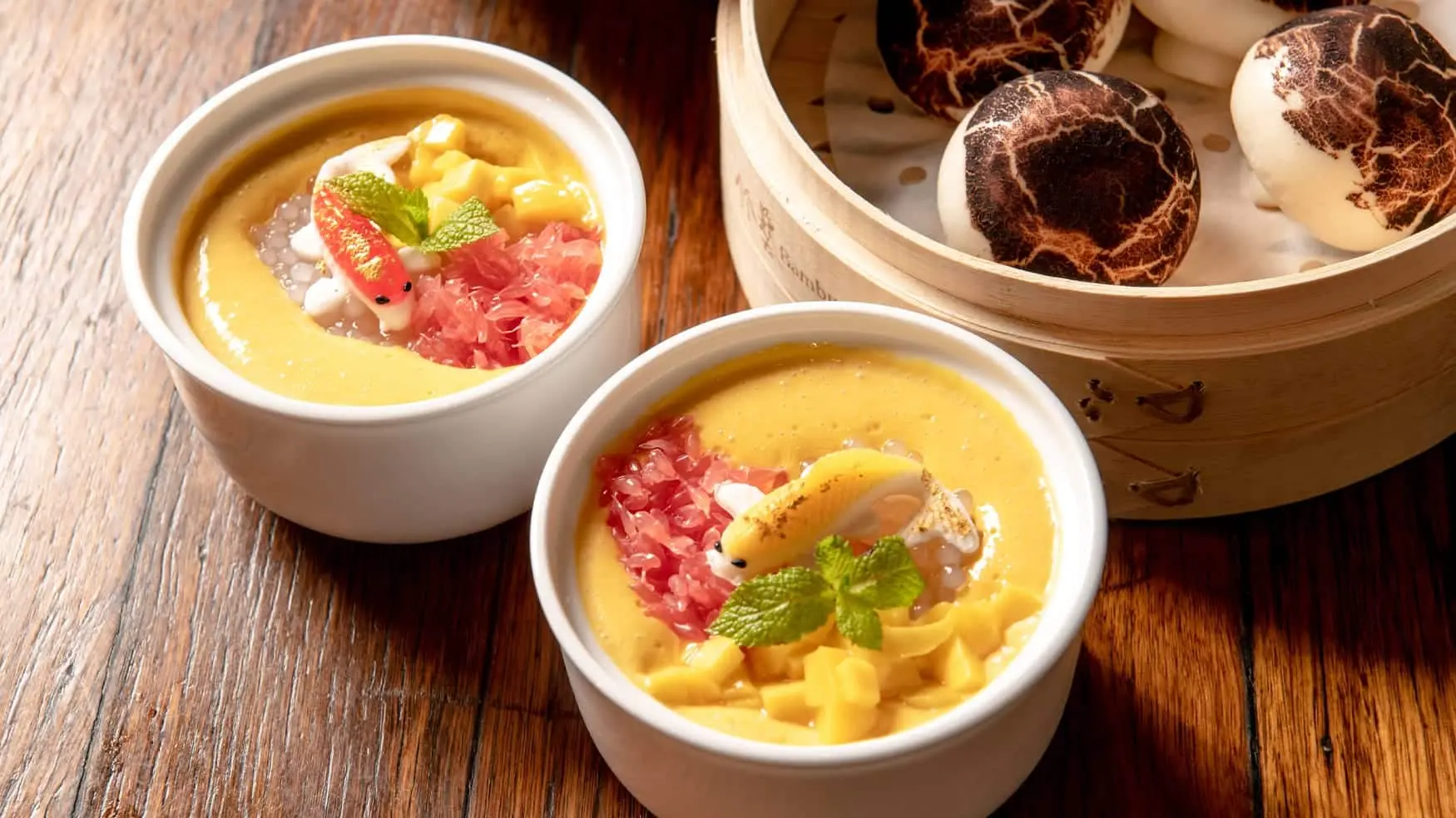 Steamed dumplings in a bamboo steam basket at District 8 restaurant.