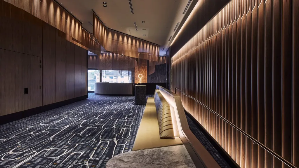 Corporate function venue interior at Cabravale Club Resort, featuring warm lighting and modern design in Western Sydney