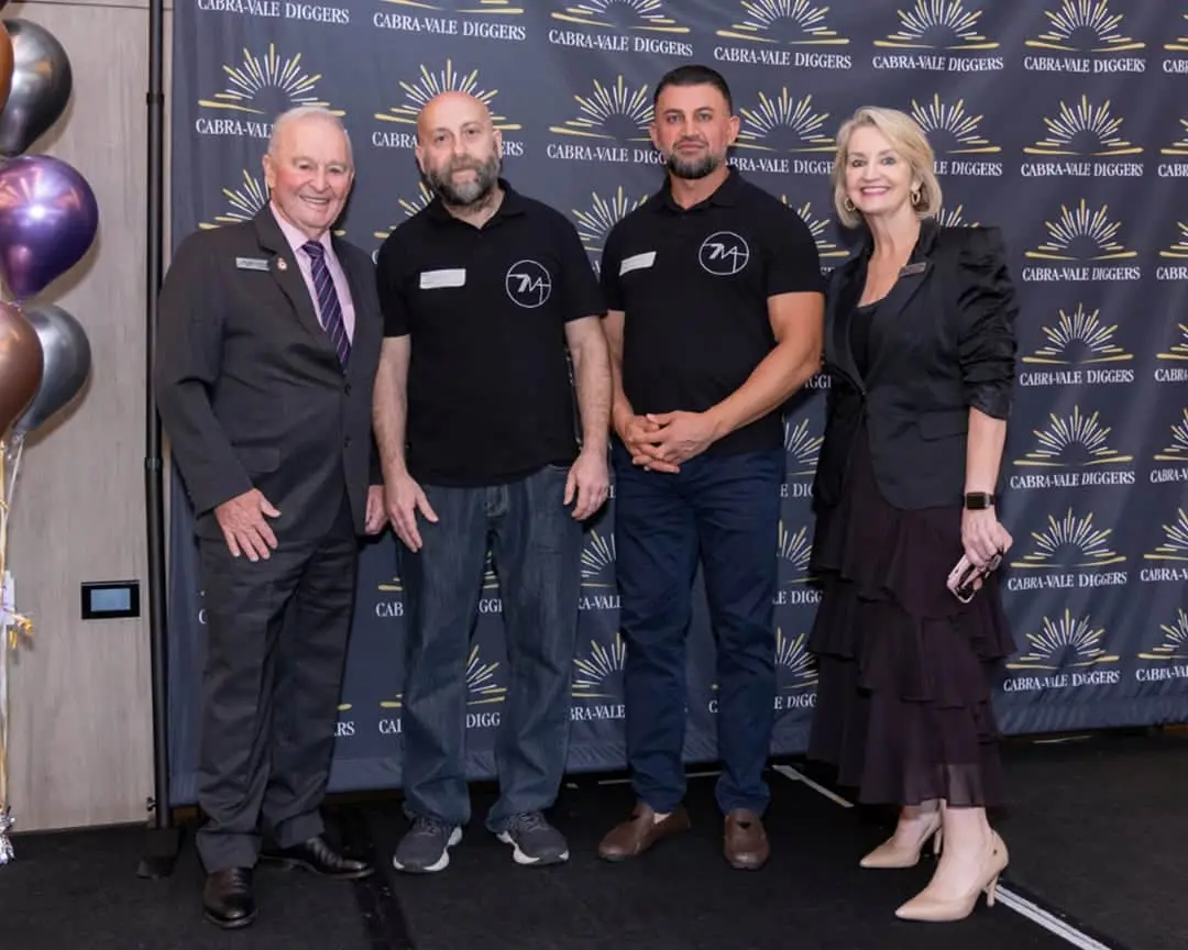 Cabravale Club Resort representatives with 777 Movement members at a Christmas event supporting the Homeless to Home project