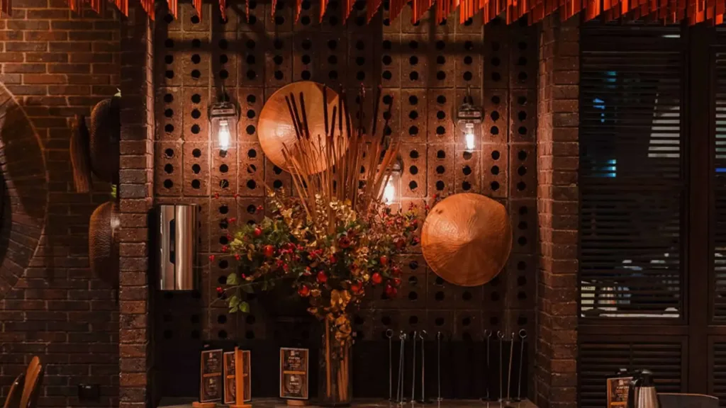 Horizon Asian Dining interior featuring a central feature wall and lighting.