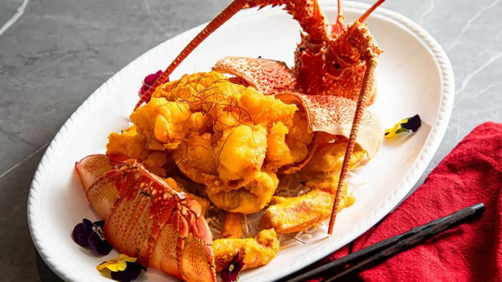 Crispy fried lobster served whole on a platter at Horizon Asian Dining