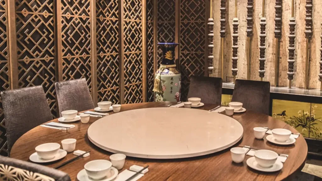 Private dining room at Horizon Asian Dining with round table, lazy Susan, and set place settings