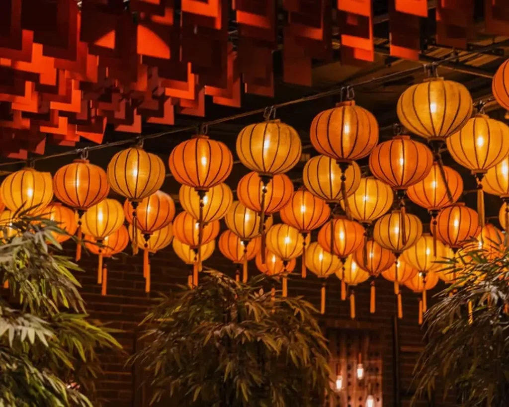 Ceiling installation at Horizon Asian dining with rows of hanging lantern lights and warm ambient glow