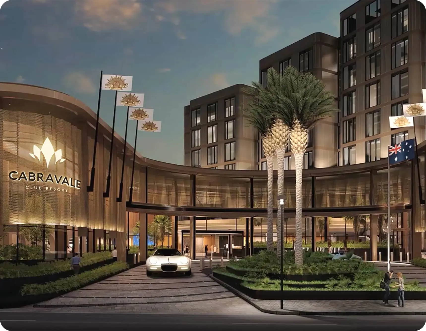 Modern resort entrance with palm trees.