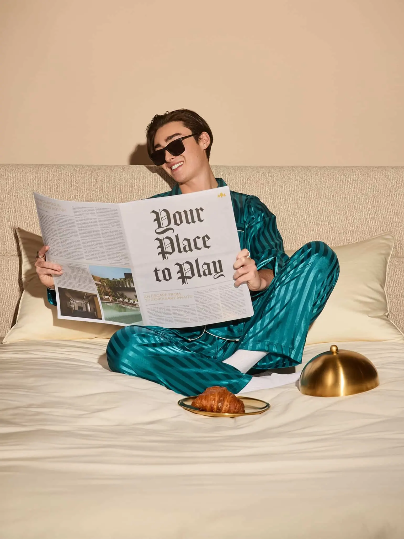 Guest enjoying room service breakfast while relaxing in hotel room