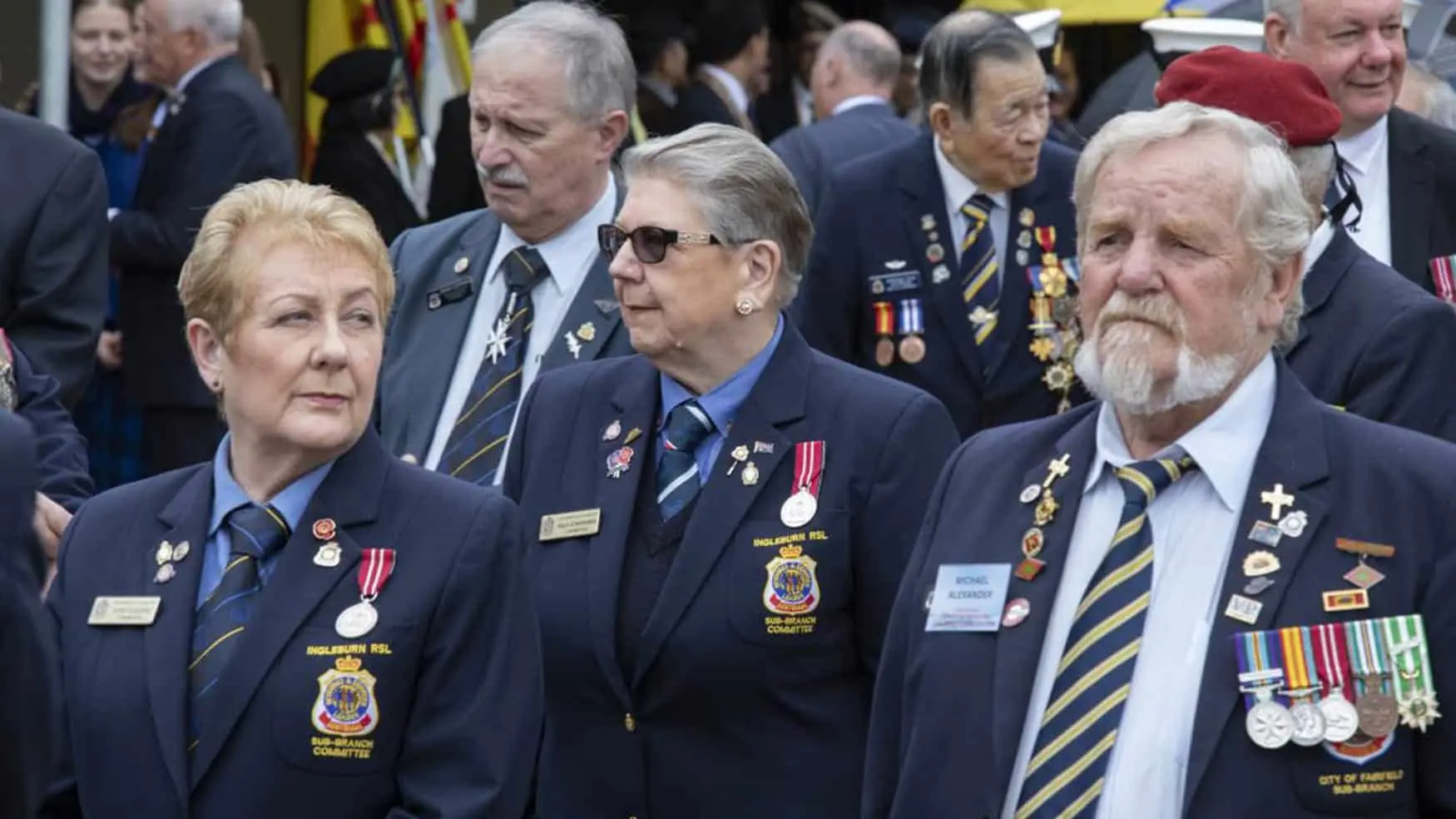 Veterans wearing service medals gather during the Victory in the Pacific 2024 commemorative ceremony at Cabravale Memorial Park.