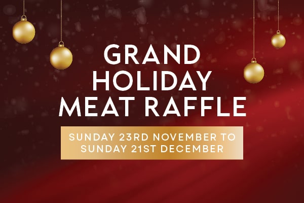 Grand Holiday Meat Raffle banner in Cabravale Club Resort with gold baubles on red background, text reads “Sunday 23rd November to Sunday 21st December”