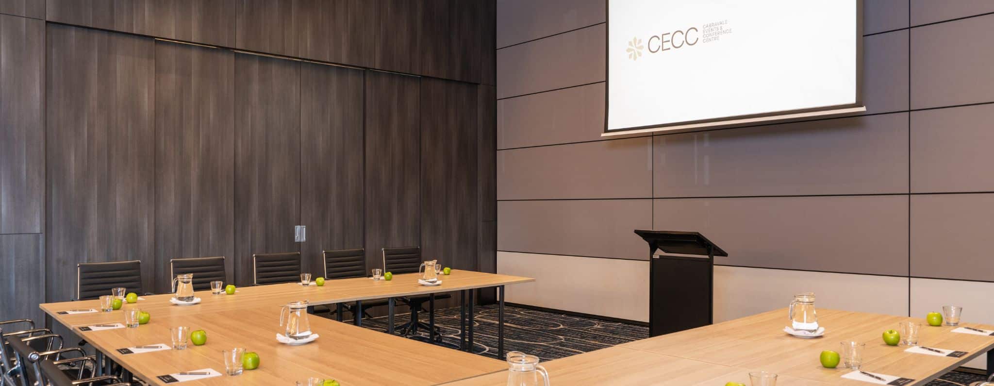 A modern conference room at Cabravale Club Resort, set up for meetings and presentations with flexible seating, integrated AV, and a clean, professional atmosphere ideal for conferences, workshops, and corporate events.