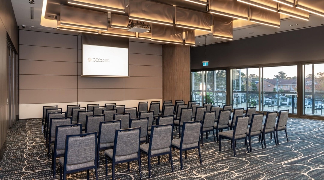 Theatre-style corporate event venue at Cabravale Club Resort, featuring modern seating, presentation facilities, and natural light, ideal for corporate events and training.