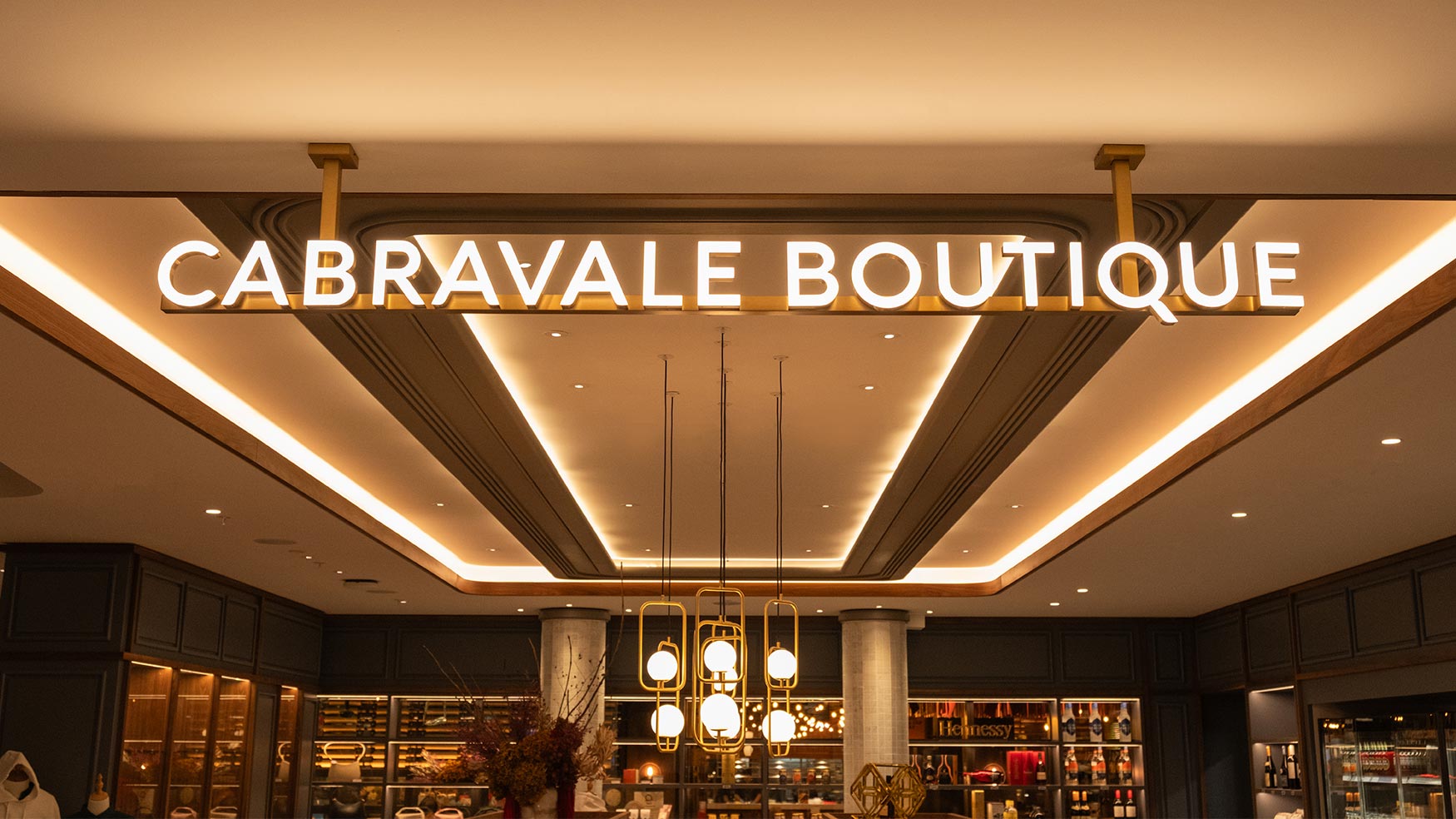 Cabravale Boutique storefront with illuminated signage at Cabravale Club Resort