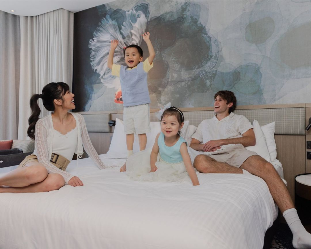 family staying in hotel for mid year hotel sale