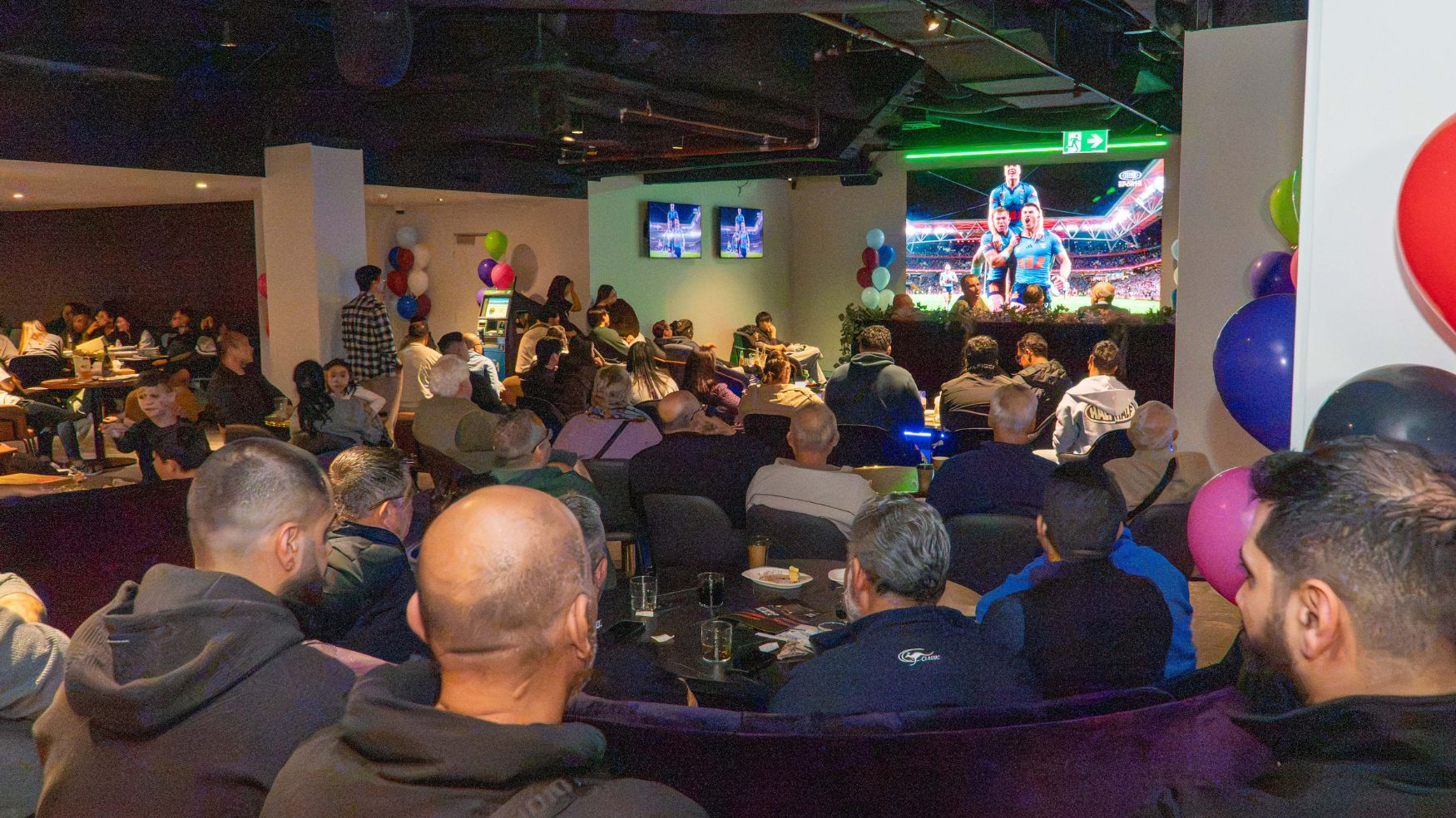 The Dugout, sports viewing lounge and bar in cabramatta and canley vale with sports fans and Big screen