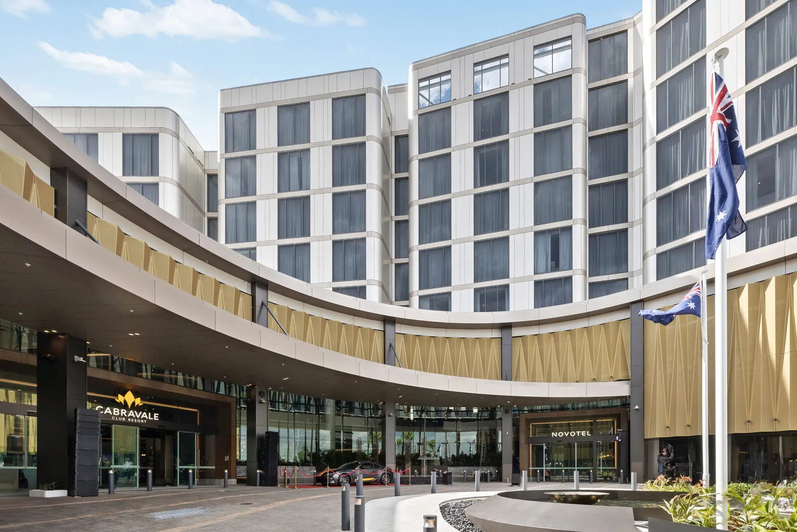 Porte cochere drop-off at Cabravale Club Resort, with the club and Novotel entrances